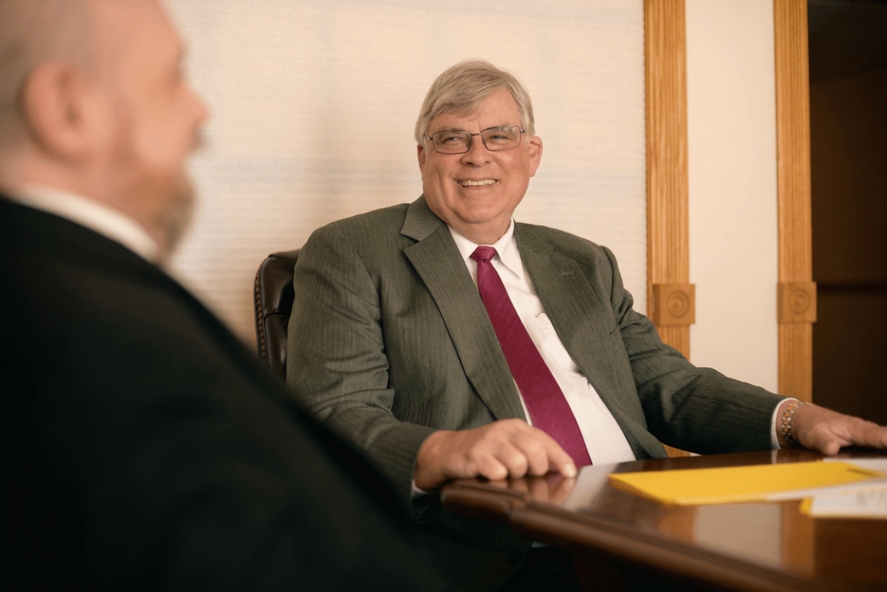 George K. Rahdert meeting with a client, 2018